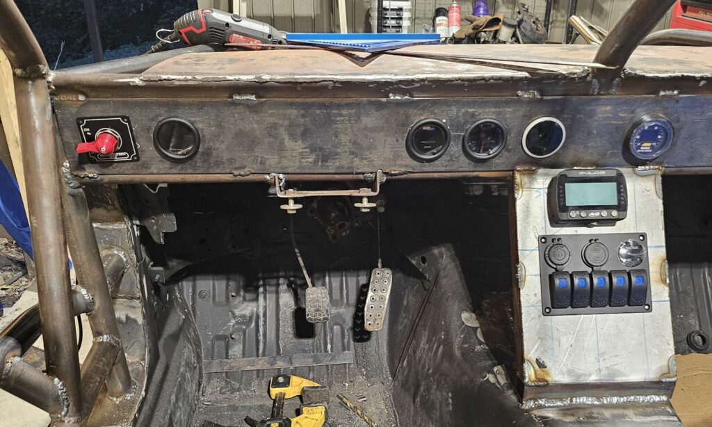 The ghettocet miata 'finished' dash and switch panel.