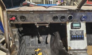 The ghettocet miata 'finished' dash and switch panel.