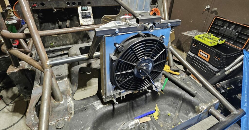 The rear mount radiator installed on the na miata exo car ghettocet.