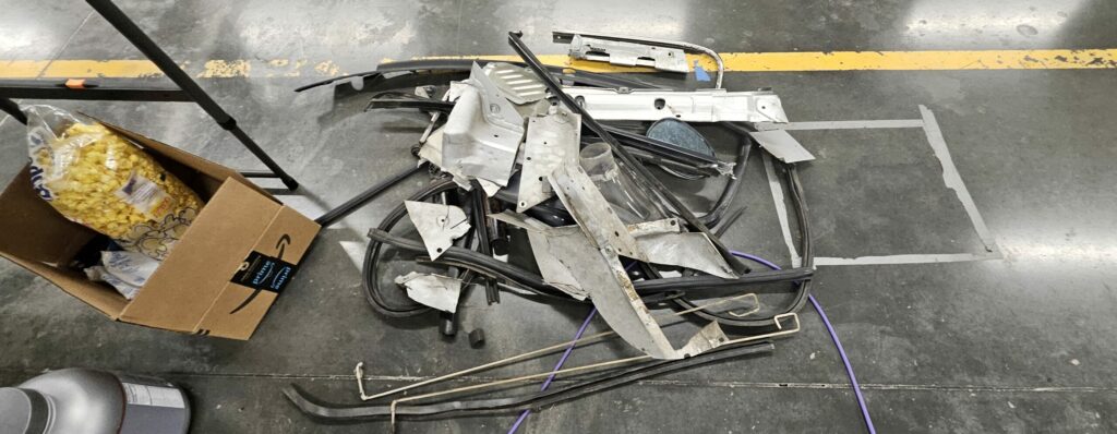 Image 2 of the discard pile for the extreme weight reduction on the Super Touring 6 Miata (ST6)
