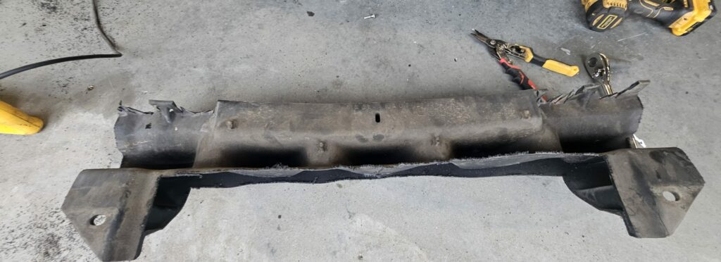 The trimmed rear bumper interior on the Super Touring 6 Miata. This was retained for structural support and bump drafting.