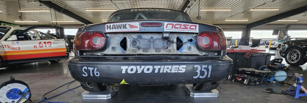The final result from the gutted rear bumper on the NA Super Touring 6 Miata for weight reduction.