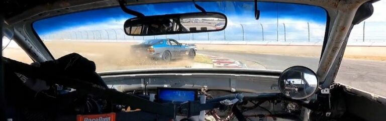 Close call racing a 944 Spec during the Aussie Pursuit at Nashville Superspeedway.