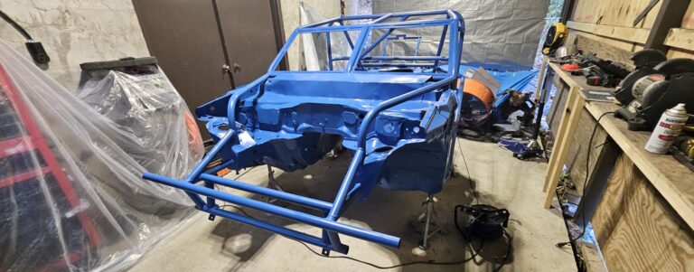 The painted chassis of the mazda miata exo car ghettocet