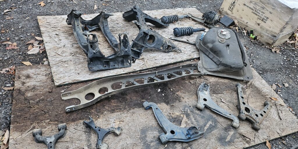 NA Miata suspension and subframe disassembled for the exo car rebuild.