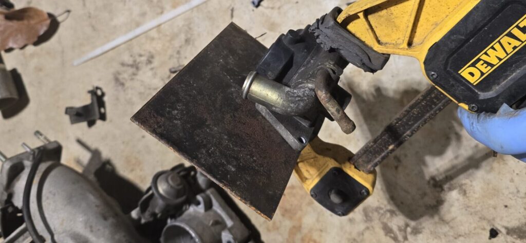 The NA Miata ISCV clamped to plate steel.