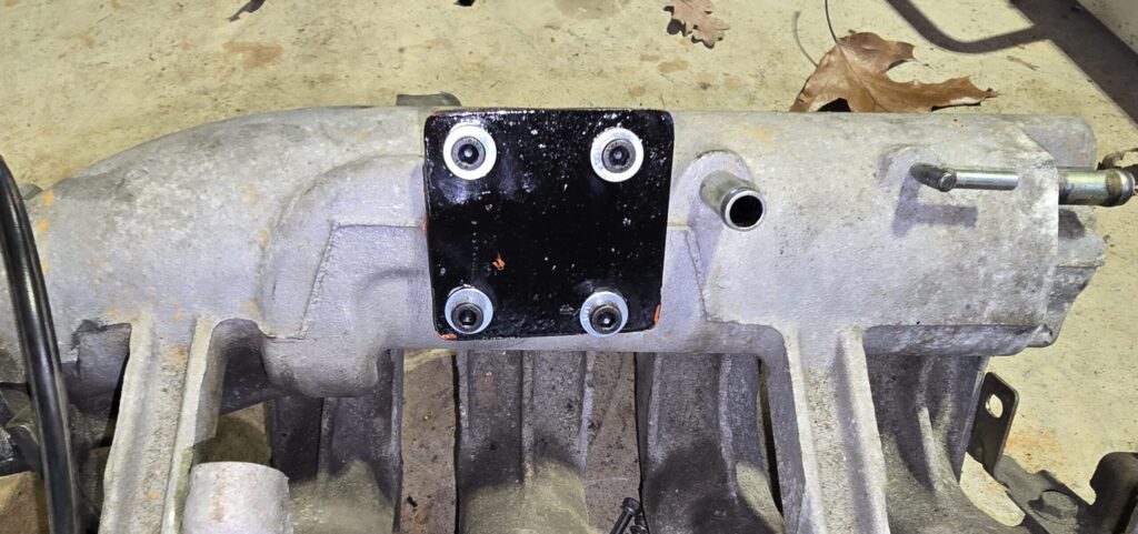 New hardware on the analog Air Valve on the intake manifold of the na miata with the 1.6 l engine.