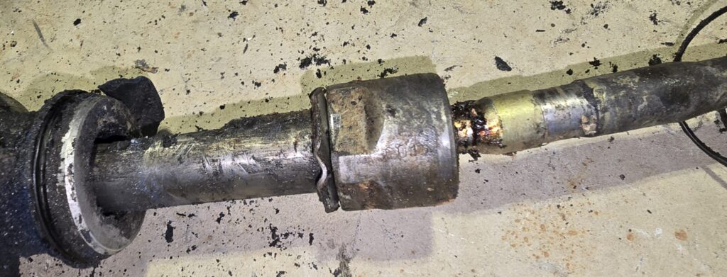 The tie rod screws onto the steering rack of the NA Miata.