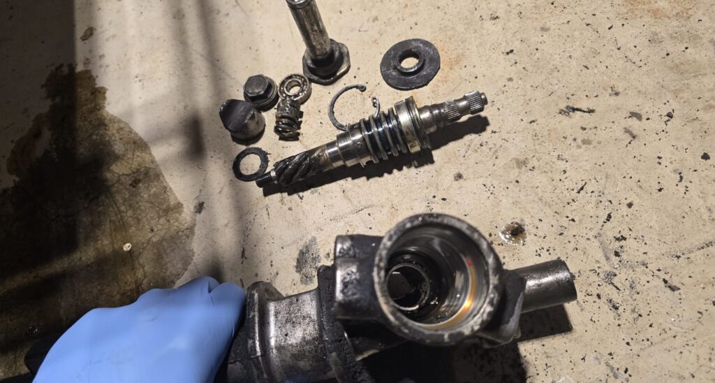 Looking at the miata pinion assembly in the steering rack.