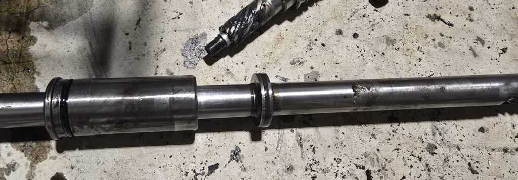 The retainer on the rack of the na miata steering.