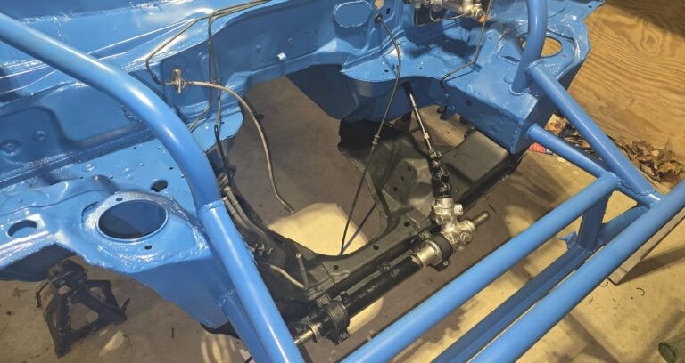 Rebuilt steering rack in the na miata ghettocet.