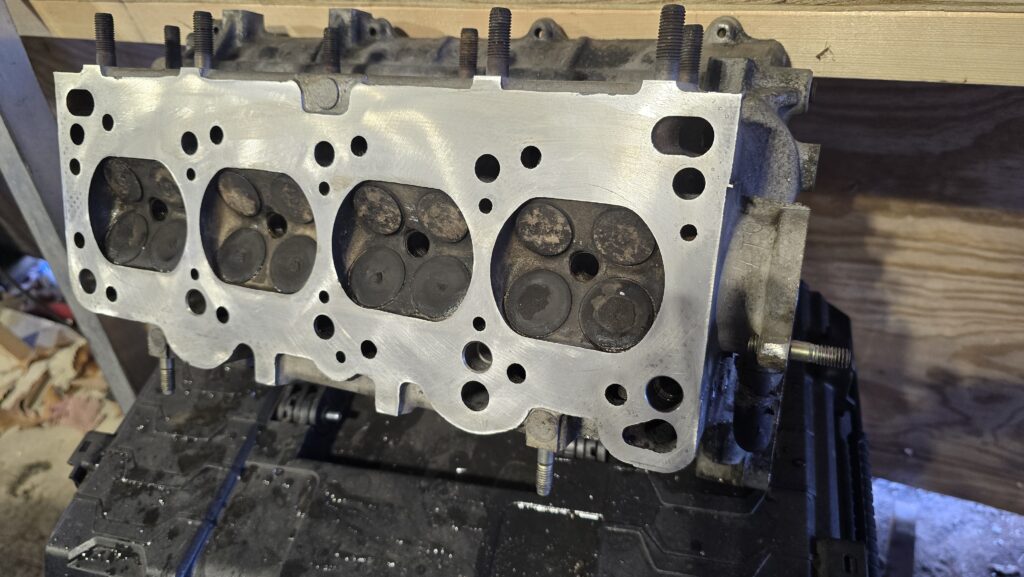 The cylinder head of the 1.6 l Miata engine before installation onto the block.