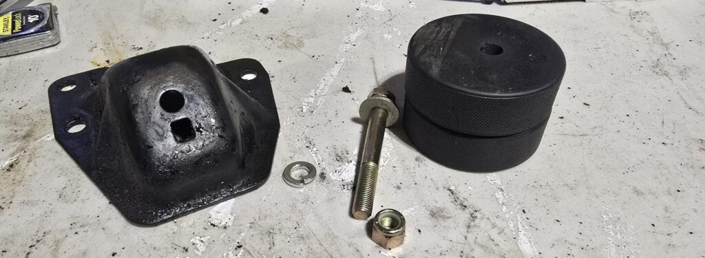 The parts needed for the hockey puck motor mount assembly.