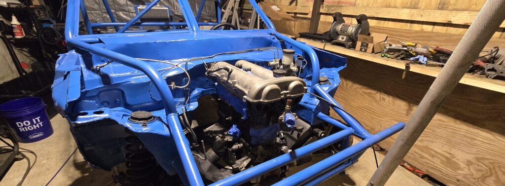 The rebuilt engine installed in the Miata ghettocet.