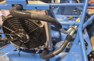 The complete coolant loop on the rear mounted radiator miata.