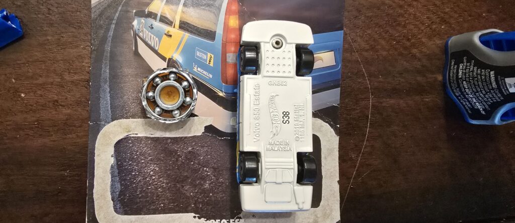 A thin bead of super glue applied to the outer bearing race.