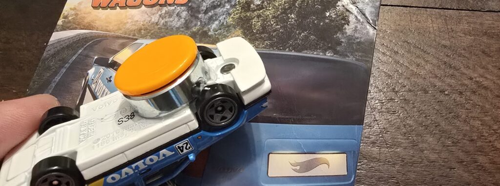 Dashboard drifter bearing attached to the Hot Wheel car.