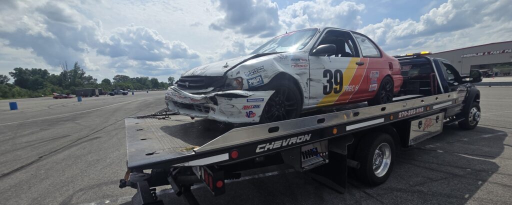The aftermath of getting punted into the wall. This would end weekend for Dover and hand the other team a DQ.